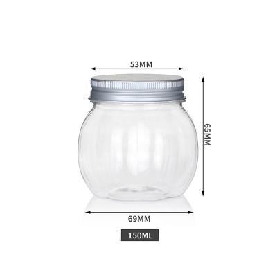 China Unique Jar 150ml Pumpkin Shape PET Food Products Plastic Pumpkin Bottle For Biscuit With Screw Cap for sale