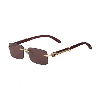 China Fashion sunglasses 2021 new style wooden grain temples sunglasses European and American fashion men's rimless sunglasses for sale