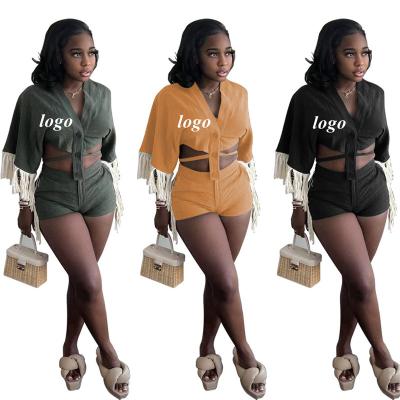 China 2022 Summer New Women's Breathable Tassel Casual Suit 2 Piece Solid Color Irregular Tops and Ultra Shorts Women 2 Piece Set for sale