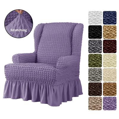 China Wingback Elastic Chair Cover One Piece High Elasticity Polyester 3D Design Slipcovers With Fringe Custom for sale