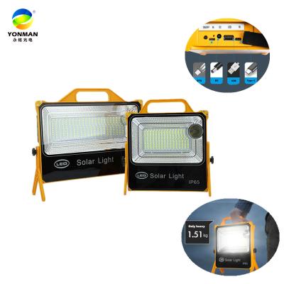 China Outdoor Multi-Functional Hand Held Emergency Light Solar Camping Rechargeable Solar Led Flood Light for sale