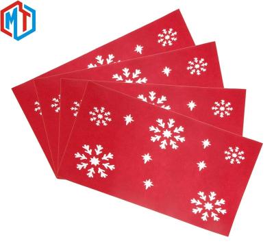 China Viable Felt Christmas Decoration Place Mat Snowflake Place Mat Red Laser Cutting Felt Place Mat for sale