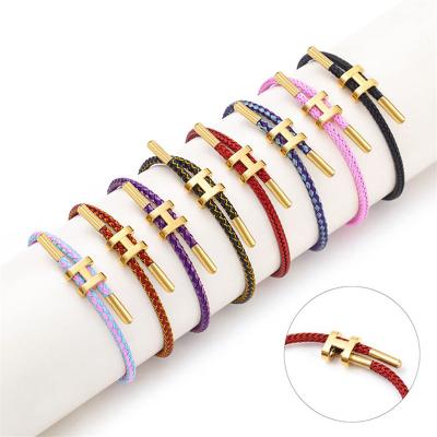 China Fashion Adjustable Fashion Gold Plated Buckle Design Titanium Steel Wire Rope Bracelet for Women Girls Gift Jewelry for sale