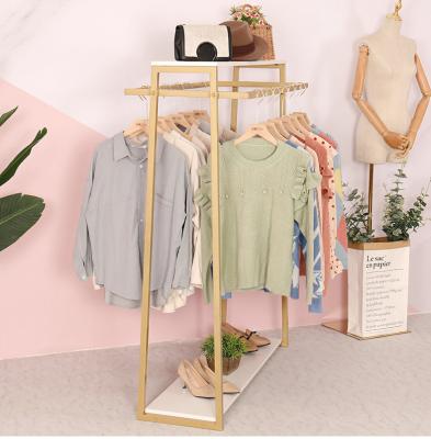 China (Others) New Clothing Store Adjustable Single Tier Nakajima Display Rack Single Double Clothes Show Rack Gold Hanging Clothes Rack Iron Floor Type for sale