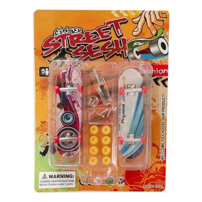 China Nice Hot Sale Cheap Plastic Finger Educational Skateboard Mini Fingerboard Child Desk Game Toys for sale