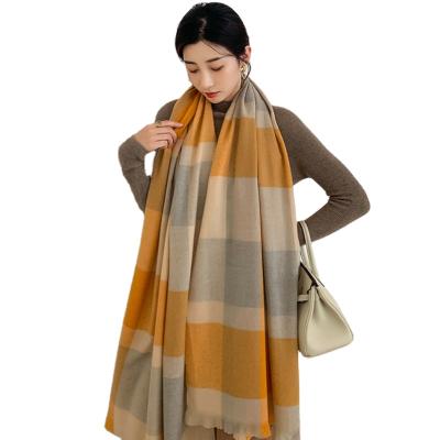 China Latest Fashion Universal Good Winter Fabric Checked Warm Printed Simple Shawls With Short Tassels for sale