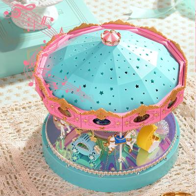 China Custom Baby Wooden Pink Blue Plastic Carousel Musical Box Carousel Musical Box for sale