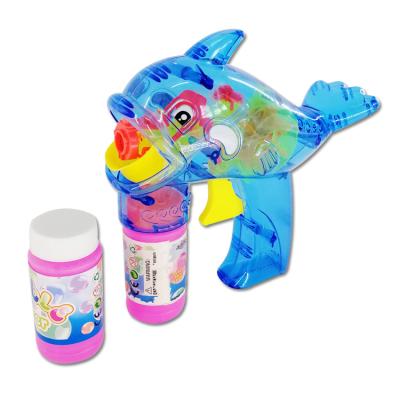 China Outdoor Dolphin Toys Soap Transparent Dolphin Sea Animal Party Bubble Gun Blowing Toy With 2 Bottles for sale