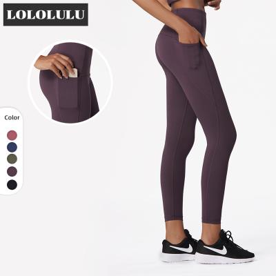 China High Waisted Softest Breathable Yoga Pants With Phone Pocket Women Gaiters Yoga Pants With Pockets for sale