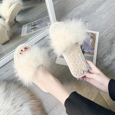 China Fluffy Women Sweat-absorbent Women's High Profile Slippers Ostrich Hair Figure Plush Slippers Autumn And Winter Women's Home Slippers for sale