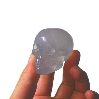 China China Wholesale Natural Stones and Quartz Fluorite Rock Crystal Clear Skulls Home Decor for sale