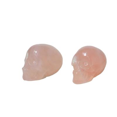 China China wholesale natural stones and quartz crystal clear pink rose crystal quartz skulls home decor for sale