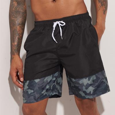 China Sustainable Patchwork Panel Shorts Beach Solid Surf Sports Running Men's Shorts Workout Shorts for sale