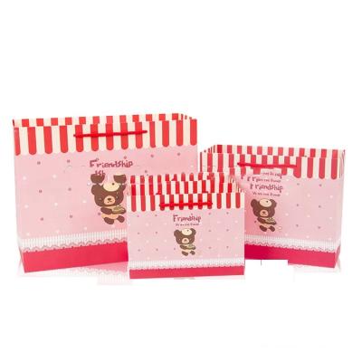 China Wholesale Disposable Customize Printed Pink Paper Gift Bags With Your Own Logo for sale