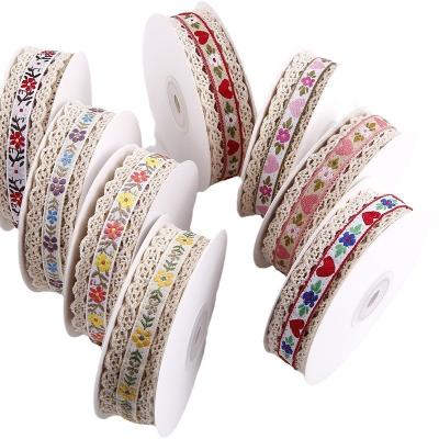 China 2.5cm Lace Edged Flroal Jacquard Ribbon Gift Packing Polyester Ribbon For Packaging for sale