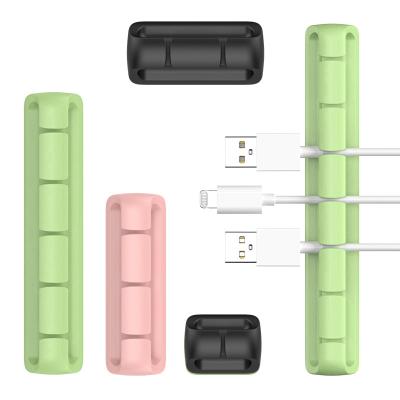 China Silicone Cable Organizer Silicone Self Clips Adhesive For Office Home USB Cable Power Cord Wire PC Desk Filling for sale