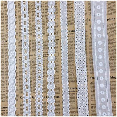 China Viable High Quality 100% Polyester Gold Tulle Guipure Cord Trim Lace Up Embroidered Fabric For African Weddings for sale