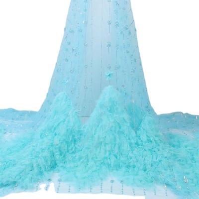 China Latest price fusible stock sequin available faux beaded trimming feather fabric backdrop ostrich feather bohomeian fabric for sale