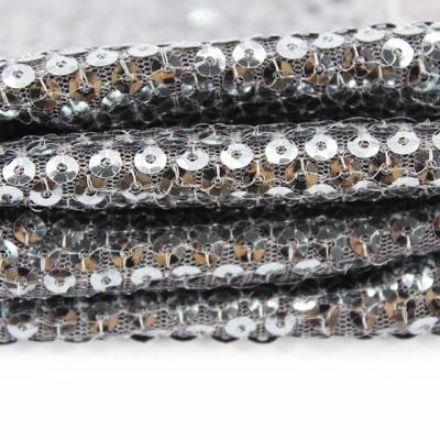 China Antistatic 100% Polyester 3D Sequin Silver / Black Dangle Sparkling Metal Sublimation Sequin Fabric for sale