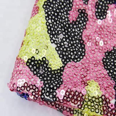 China Colorful Heat-insulation factory sale knit tetra fabric camouflage sequin fabric for dress for sale