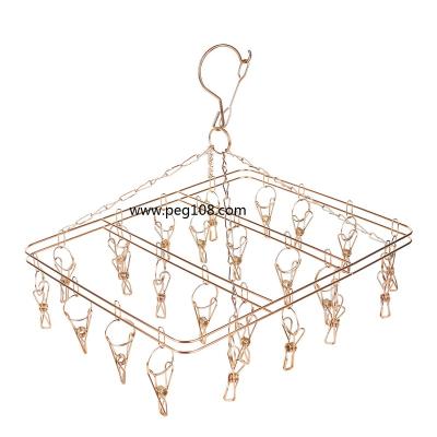 China Modern Rose Gold 316 Stainless Steel Clothes Hanger And Drying Rack With 24 Pegs Hangers for sale