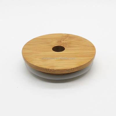 China Custom Logo Natural Eco Friendly 70mm/65mm Custom Size Reusable Bamboo Lids With Straw Hole for sale