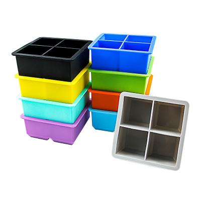 China Viable Wholesale Food Grade 4 Cavity Square Large Ice Cube Maker Molds Silicone Mold Ice Cube Tray With Removable Lids for sale