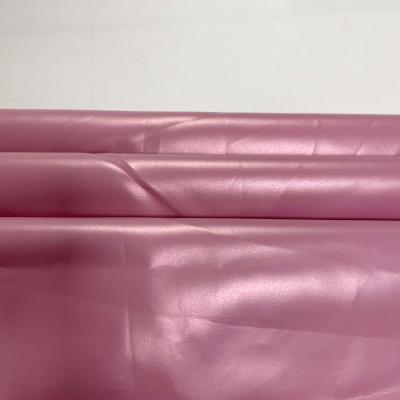 China Waterproof Shiny Pearlescent Frosted Pongee PU Waterproof And Antifouling Lamination Fabric for sale