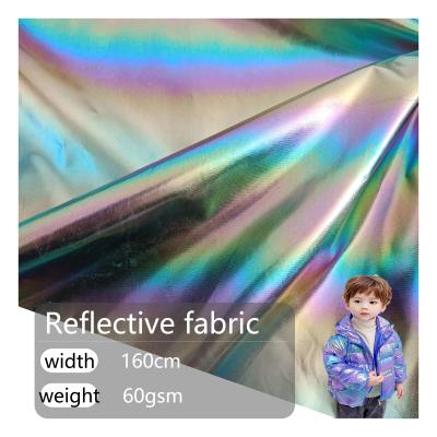 China Polyester Color Reflective Material Rainbow Reflective Fabric For Clothing for sale