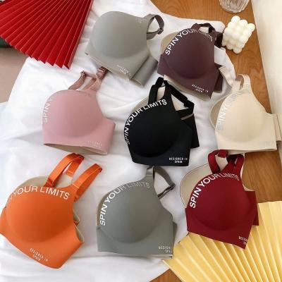 China Traceless Pump Hot Selling British Alphabet Comfortable And Breathable One Piece Bra For Women Gather And Lift Wireless Bra for sale