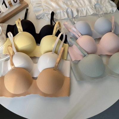 China Simple and Natural Girls Traceless Push Up Wireless Bra With Stripes Soft One-Piece Gathering Seamless Bra for sale