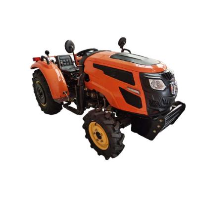 China Hotels Agriculture Hand Walking Tractor Four Wheel Mini Garden Tractor Mini Tractor for sale