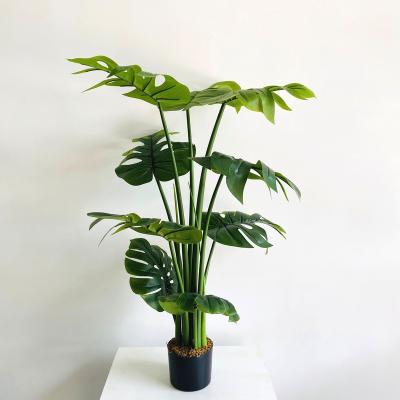 China Cheap Sale 120cm Style Fake Plant Monstera Minimalist Nordic Plastic Tree Artificial Trees For Indoor Outdoor Decor for sale