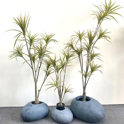 China Wholesale Stock New Design Artificial Lan Tree Indoor Decor Minimalist for sale