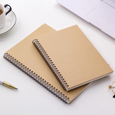 China Easy Enrolling A5/B5 Pure Wood Pulp Kraft Paper Cover Strap Notebook Spiral Coil Notebook Notepad for sale