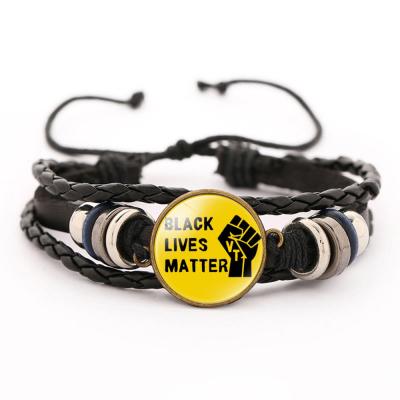 China Hiphop popular jewelry personalized newest hip hop charm leather woven black lives matter bracelet for sale