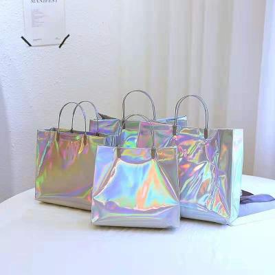 China New Waterproof PVC Outdoor Pattern Waterproof Tote Bag Plastic Shopping Bag Laser Package Surface Or Gift Bag for sale