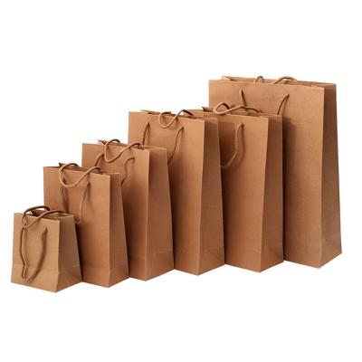 China 100% Eco-friendly Custom Craft Shopping Handle Sliver Brown Paper Gift Bags With Your Own Logo for sale