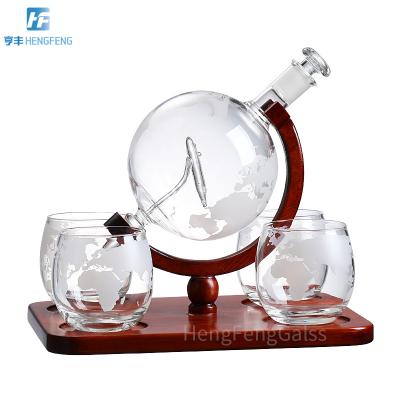 China 2021 Viable Popular Hot Sale 850ML Whiskey Globe Decanter With Wooden Base With 4 Cups Whiskey Gift Set Luxury Decanter for sale