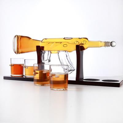 China Sustainable Luxury Handmade Glass Product Dispenser Opportunities Gun Shaped Liquor Bottle For Sale for sale