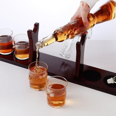 China Viable new products china glass bottle decanter ak 47 handmade glass bottle decanter gun shape whiskey decanter for sale