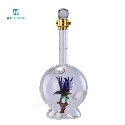 China Gift & Craft China factory selling premium bespoke 750ml 700ml tin metal labels novelty spirit glass bottle vodka for sale