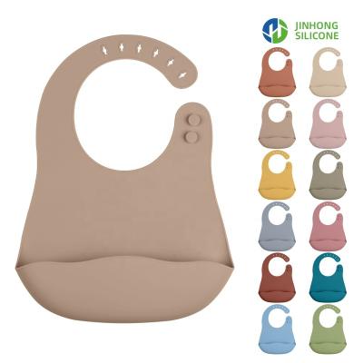 China BPA Free Silicone Baby Roll Up Baby Bib Ppa Free Set 10pc Christmas Bucket Refine Adjustable Kids Silicone Baby Bibs Anti-dirty for sale