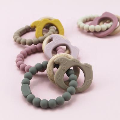 China Soft Cute Animal Baby Toy Ring Wooden Silicone Elephant Teether from Toy Wholesale Modern New Design for sale