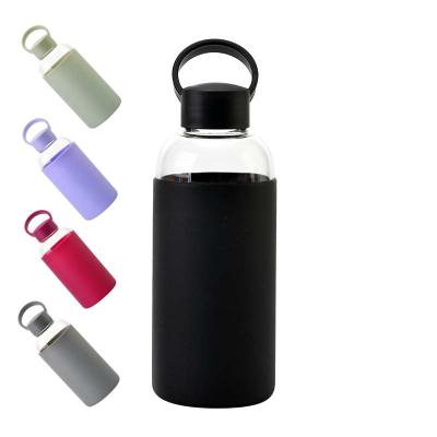 China Sustainable Multi color custom logo silicone sleeve durable borosilicate glass drinking water bottles for sale