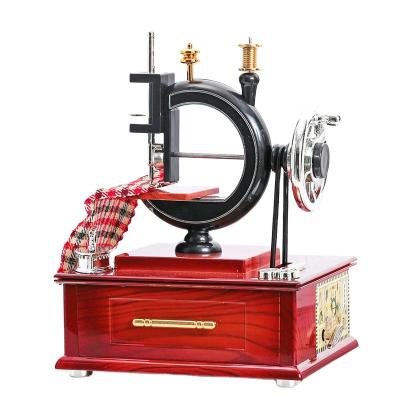 China Antique Looking Plastic Mini Sewing Machine Music Box of Cogs for sale