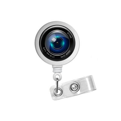 China Retractable Nurse Badge Reel G0537 Camera Lens Photo Glass Capsule ID Badge Reel for sale