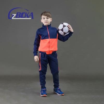 China Custom Logo Anti-UV Sublimated White Polyester Suit Wholesale Simple Jogging Kids Tracksuit for sale