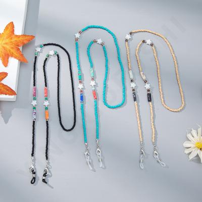 China New Trendy Design Monocle Holder Boho Custom Glass Beads Natural Stone Masking Star Lanyard Chain 73cm for sale