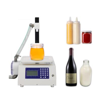 China Automatic food cheap price automatic jar machines stick liquid honey desktop filling machine for honey for sale